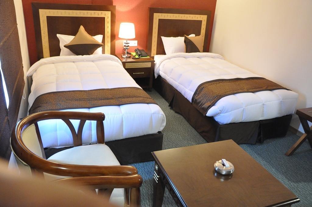 Silk Route Hotel Guwahati Phòng bức ảnh