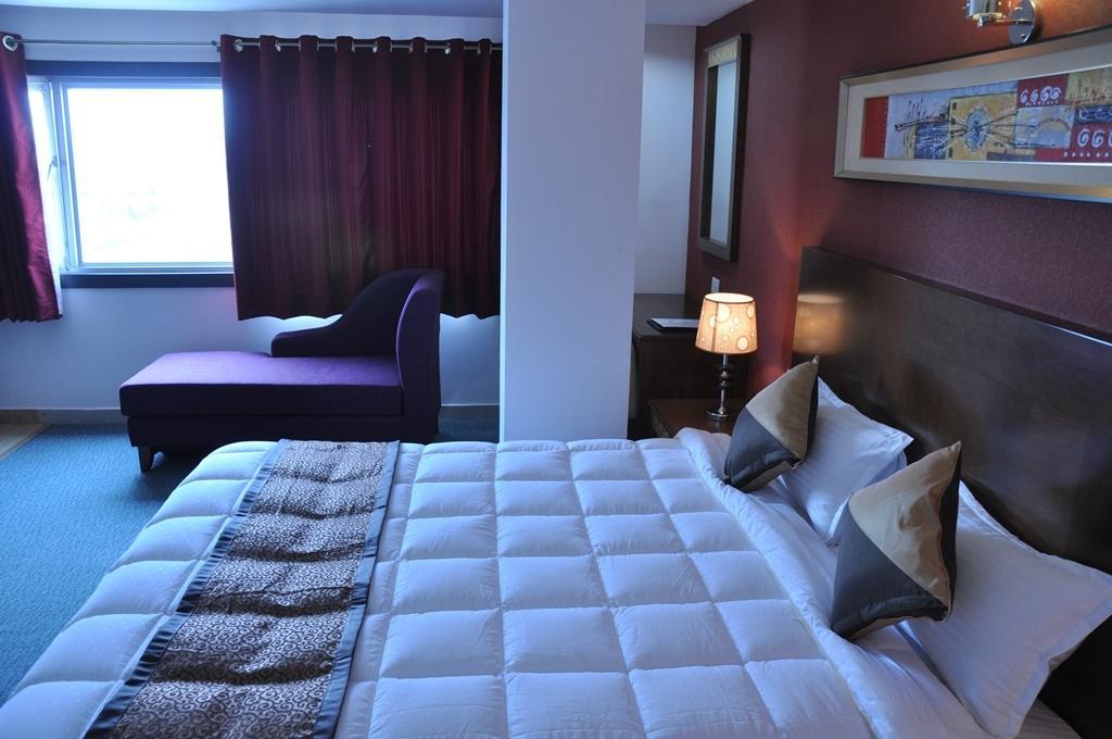 Silk Route Hotel Guwahati Phòng bức ảnh